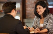attractive woman job interview in coffee shop
