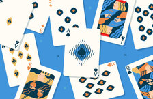 Illustration of various playing cards against a blue background