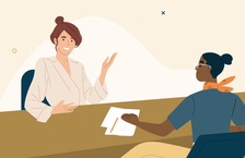 Illustration of two women sitting across from each other and talking during an interview