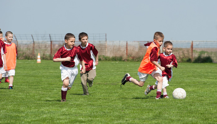 kids playing football