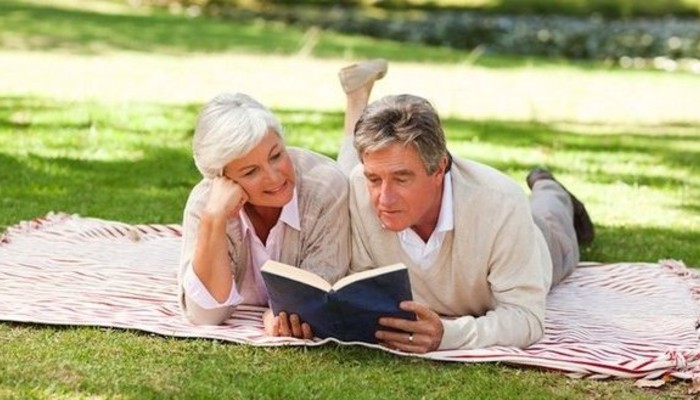 old couple reading book