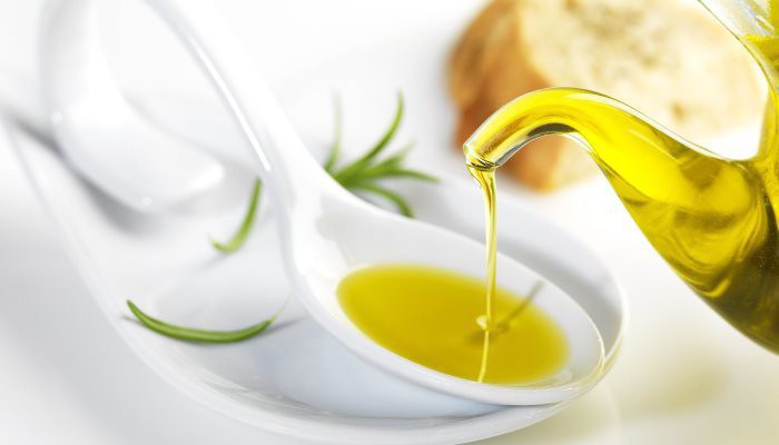 pouring olive oil