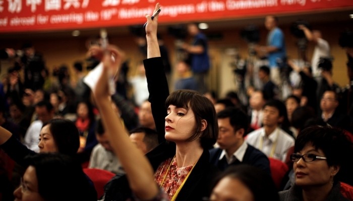 Raising hand to ask a question