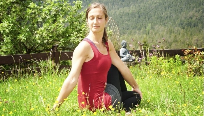 Seated Twist Yoga in the Garden