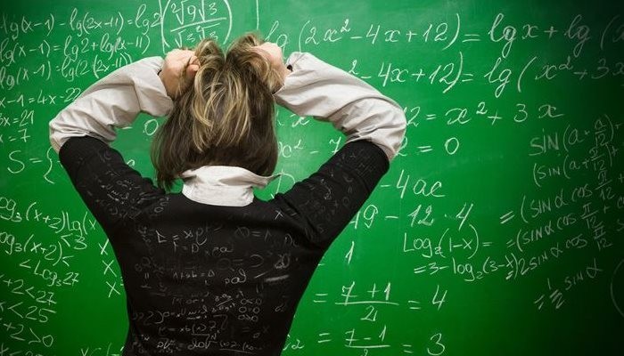 woman frustrated at maths