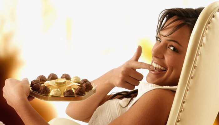 woman eating chocolate