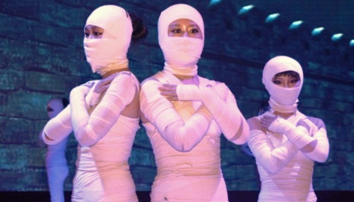 women dressed as mummies
