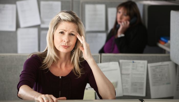 anxious woman at work
