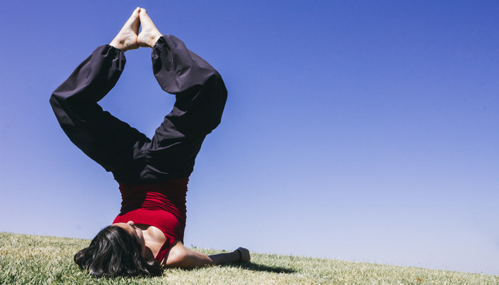 Woman doing yoga outdoors