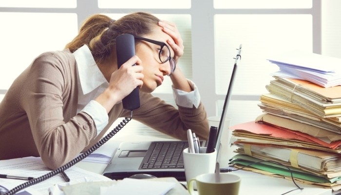 Stressed woman on phone