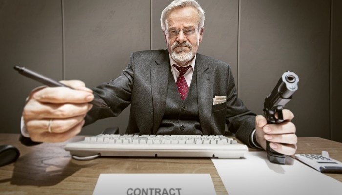 business man wanting you to sign