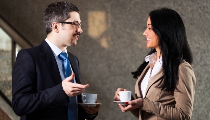 people talking at event