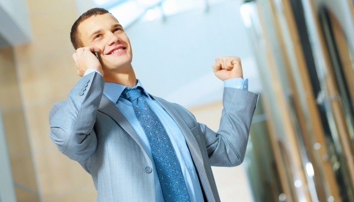 happy young profesional talking on the phone