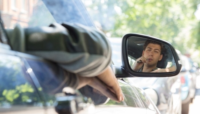 Man stuck in traffic jam