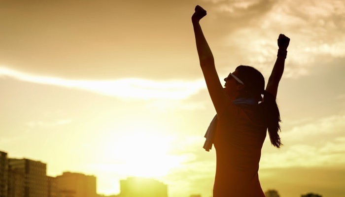 woman raising hands