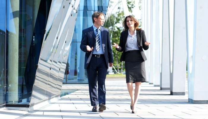 Business people on walking meeting
