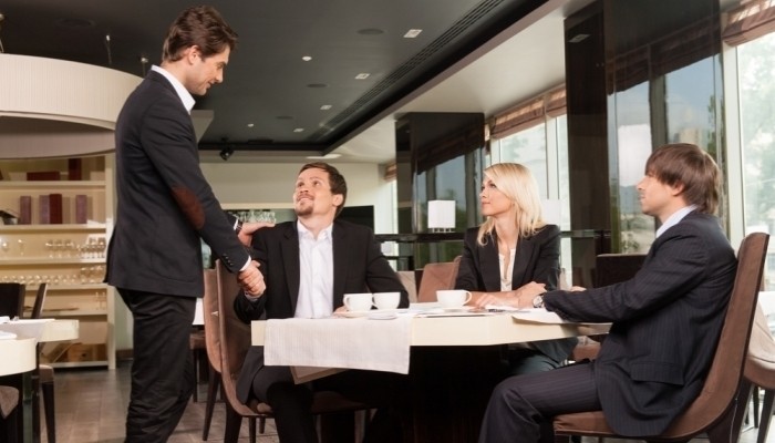 group of well dressed business people