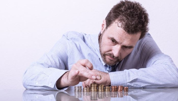Man counting coins