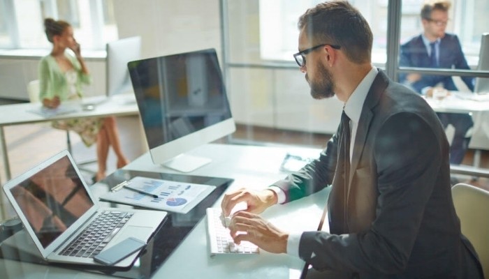 man on computer