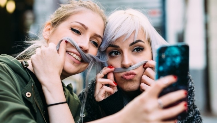 women taking a selfie