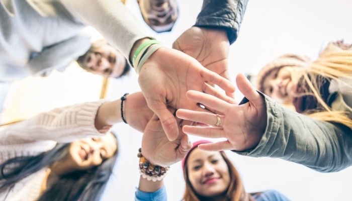 friends giving hands