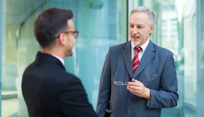 businessmen talking