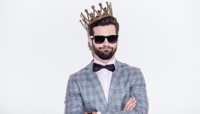 businessman wearing crown