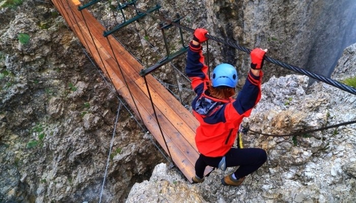 woman climbing the mountain