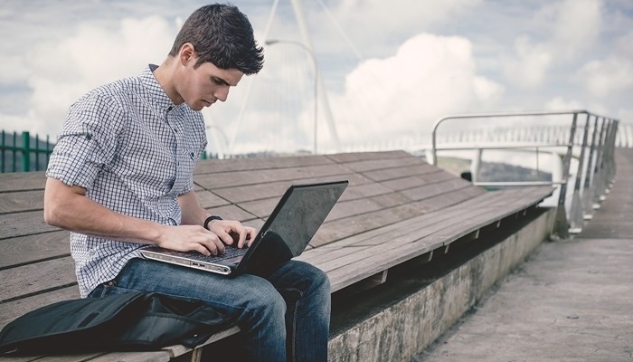 man on computer