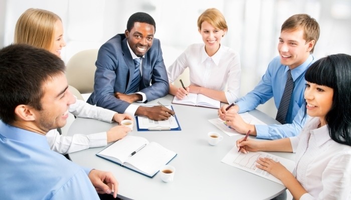 businesspeople working at meeting