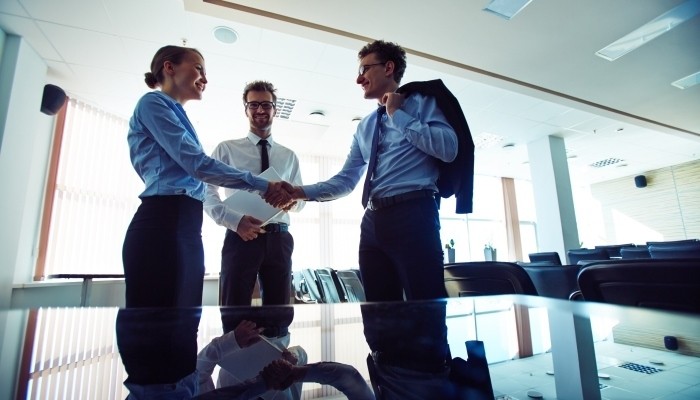employees shaking hands