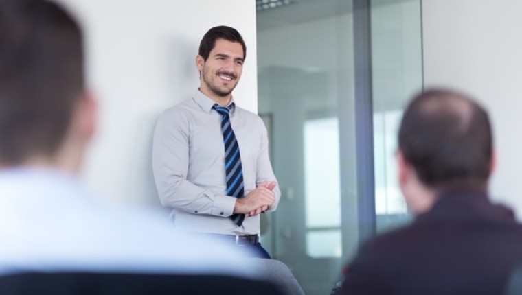 man talking to people