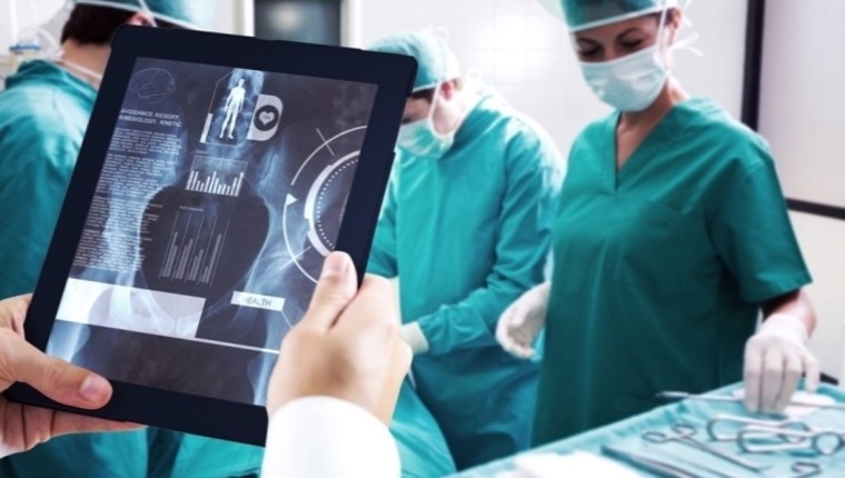 doctor using tablet computer