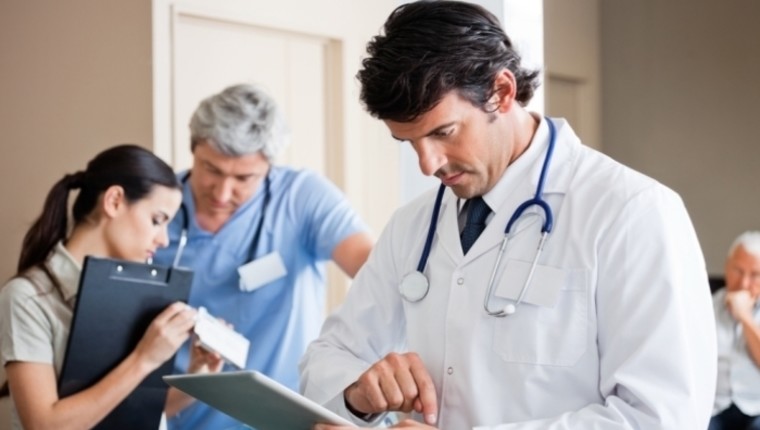 male doctor with tablet computer