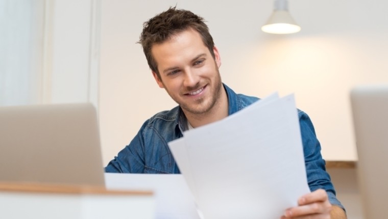 businessman reading paperwork