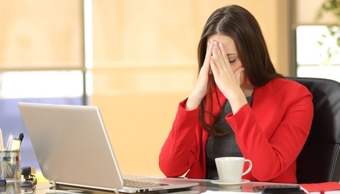 Woman stressed out at work