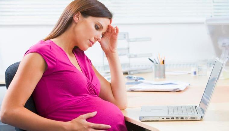 Pregnant woman at work