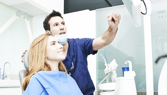 Dentist with patient