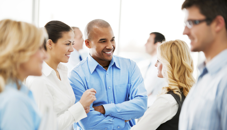 Professionals at networking event