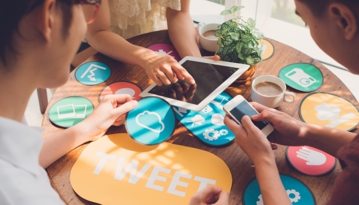 Group of people with mobile and tablet