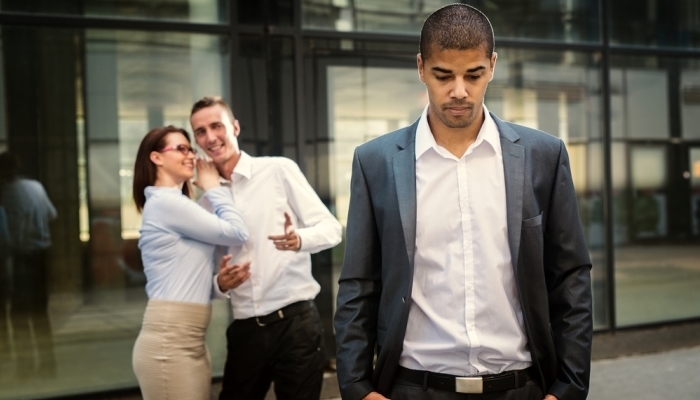 People gossiping about coworker