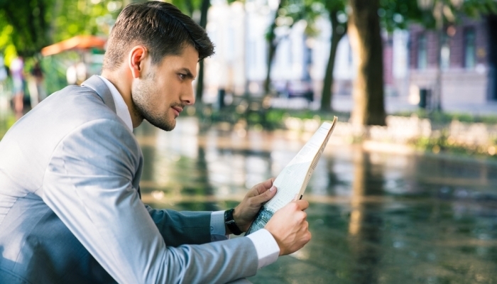 man reading paper