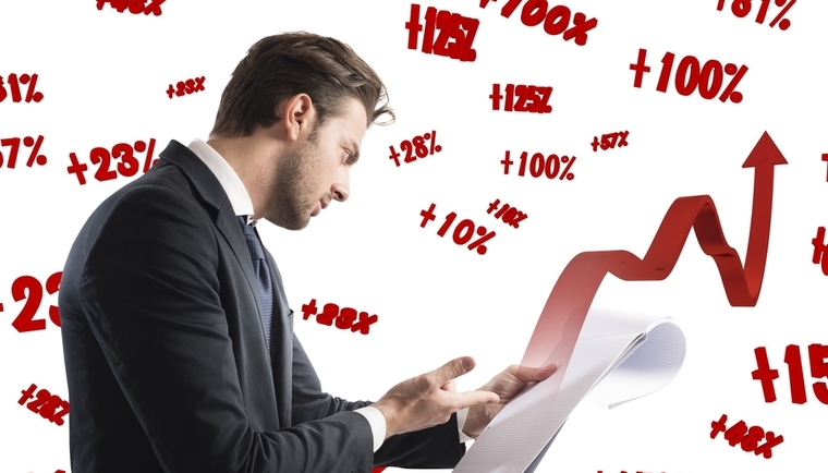 Businessman analyzing profits