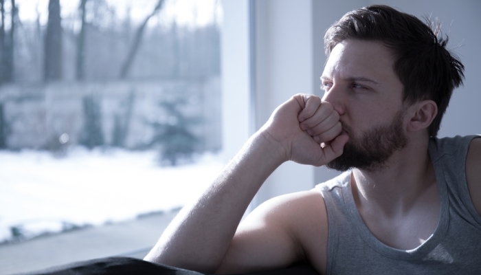 man looking outside