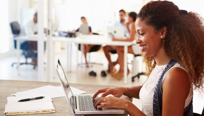 Young woman using laptop