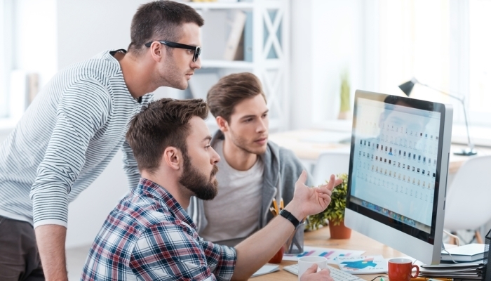 looking at the computer monitor together
