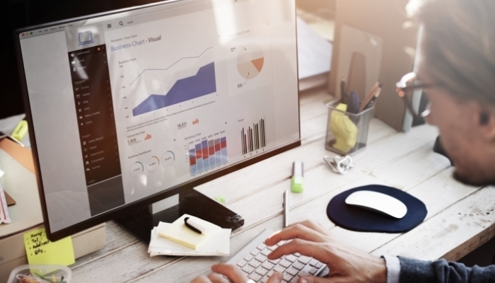businessman working with dashboards on computer