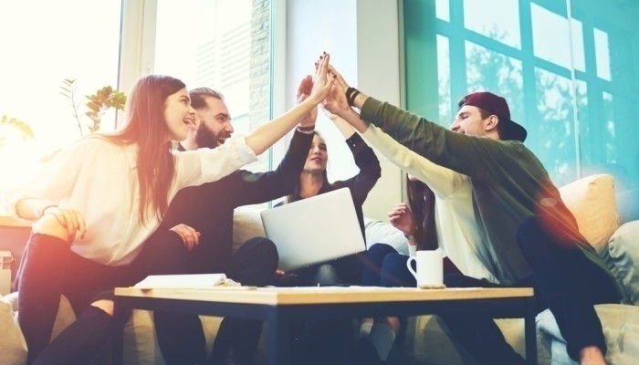 motivated employees high five
