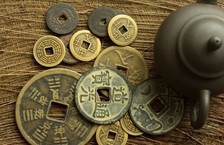 old chinese coin on tea table