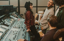 Musicians at work in a studio